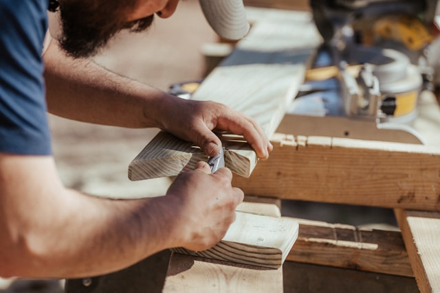 A man working on a piece of wood